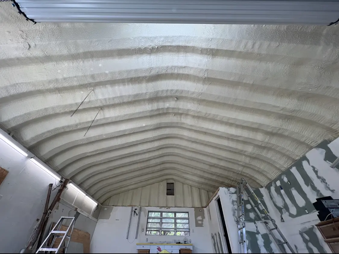 Spray polyurethane foam applied to the underside of a metal roof deck in Simsbury